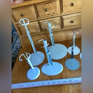 7 doll holders or White and Gray Jewelry Stands